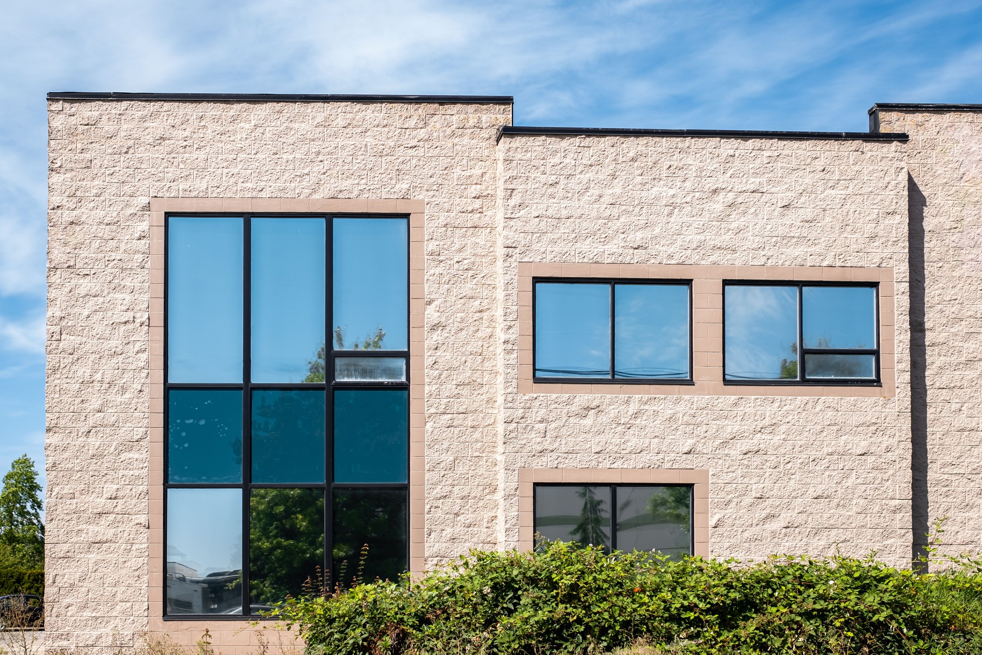 Modern suburban low rise office building. Architectural Exterior of Modern Low Rise Commerical Office Building Facade.